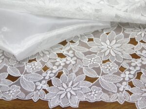 Lace fabrics in white  Antonietta tessuti a Torino