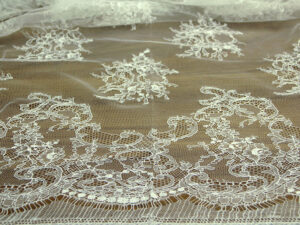 Lace fabrics in white  Antonietta tessuti a Torino